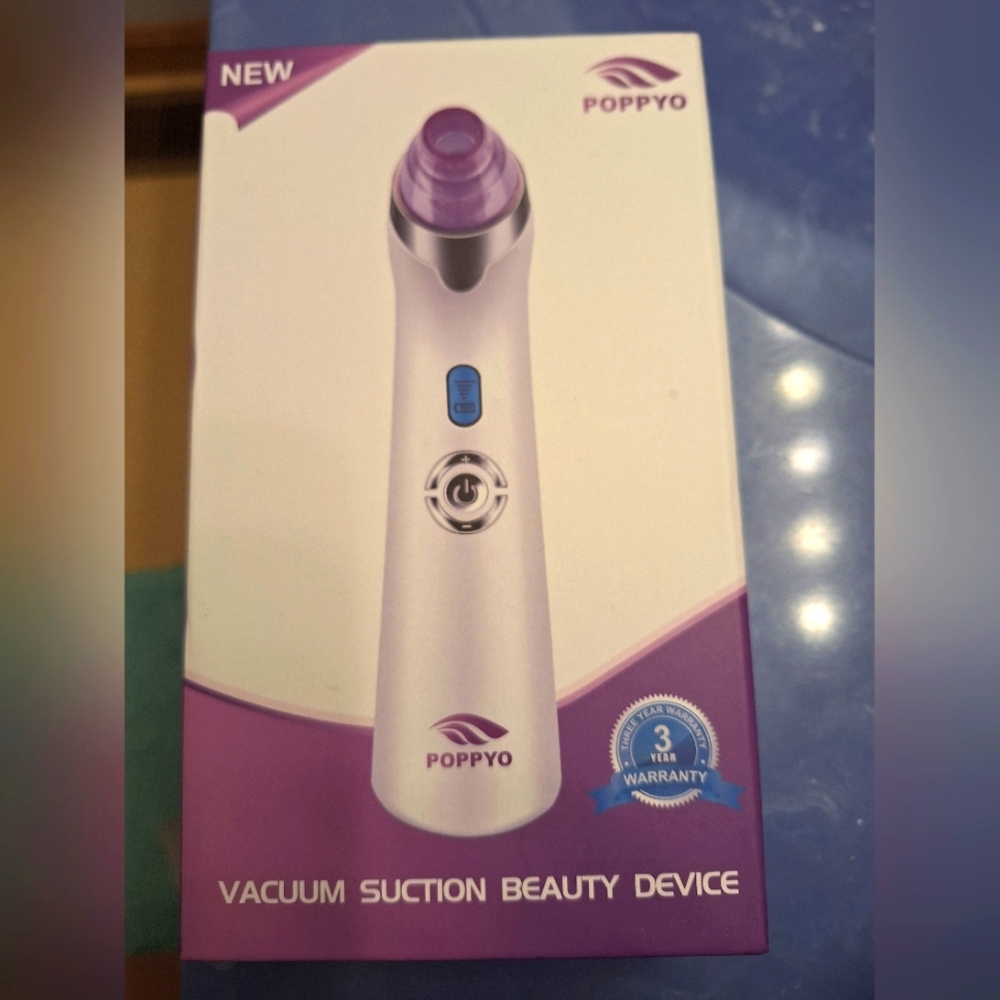 Poppyo Vacuum Suction Beauty Device - White and Purple
